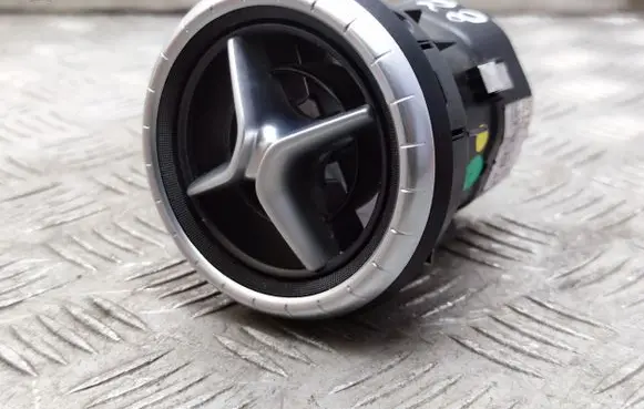 Dash center air vent grill