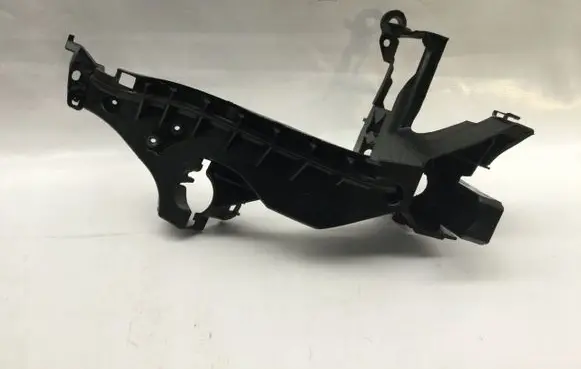 Headlight/headlamp mounting bracket