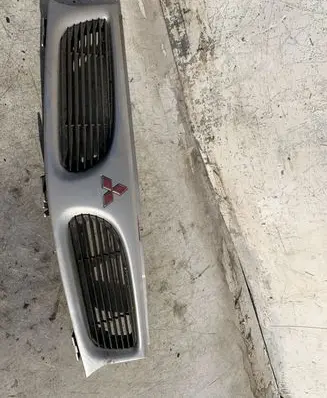 Mitsubishi Carisma Front bumper upper radiator grill