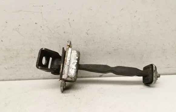 Skoda Octavia Mk2 (1Z) Rear door check strap stopper