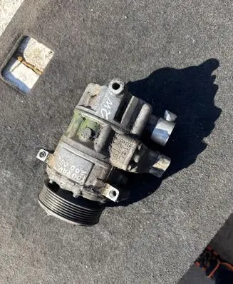 Volkswagen Touran I Air conditioning (A/C) compressor (pump) 03952210563 1K0820803