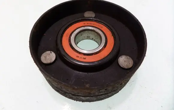 Opel Astra H Belt tensioner pulley 6203LHA