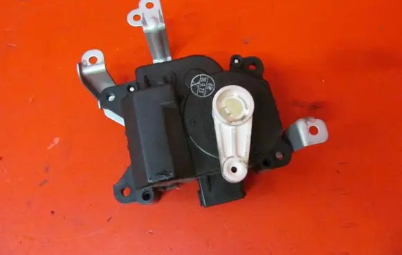 Suzuki Swift I Air flap motor/actuator 0637007340