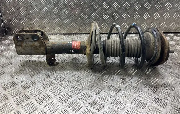 Toyota Avensis T250 Front shock absorber with coil spring 