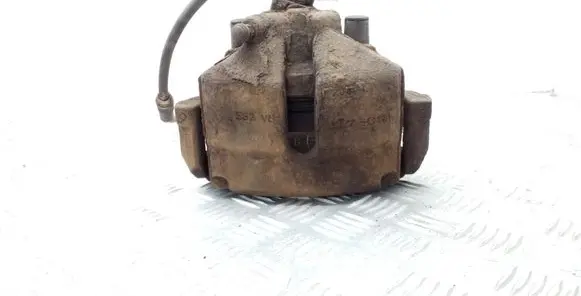 Volkswagen Golf VI Front brake caliper 582