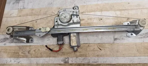 Rear door window regulator with motor