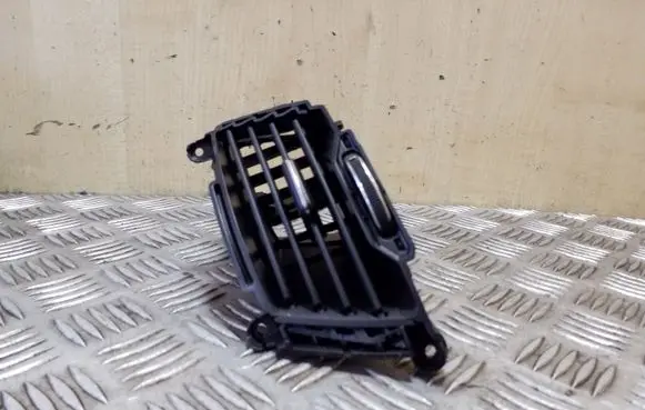 KIA Sportage Dash center air vent grill 974103W000