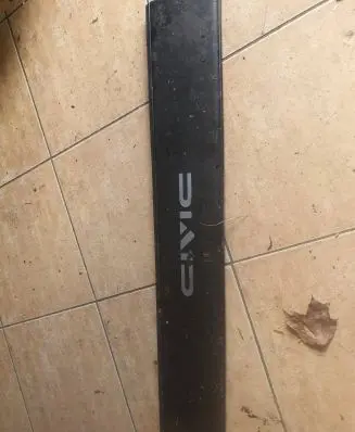 Trunk/boot lower side trim panel