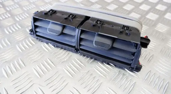 Toyota Yaris XP210 Dash center air vent grill 55670K0050
