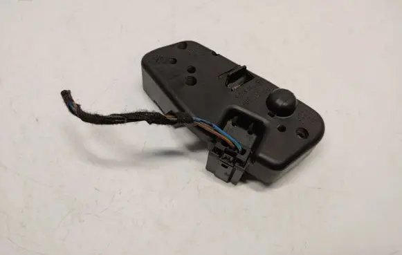 Tail light bulb cover holder