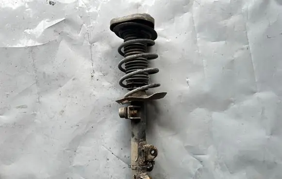 Mercedes-Benz E W212 Front shock absorber with coil spring A2123230020