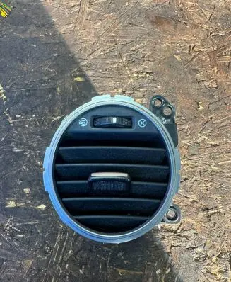 KIA Carens II Dash center air vent grill 974101D000 80464948