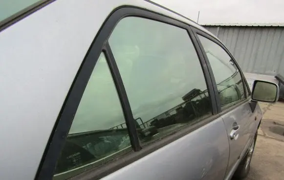 Cadillac SRX Rear door window glass 