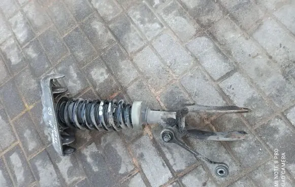 Volkswagen Touareg I Front shock absorber/damper 7L6412022