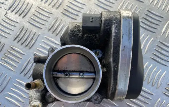 Volkswagen Caddy Throttle valve 06A133062AD 100631 A2C53043740