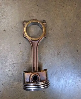 Piston with connecting rod