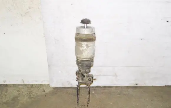 Volkswagen Touareg I Air suspension front shock absorber 7L6616040D