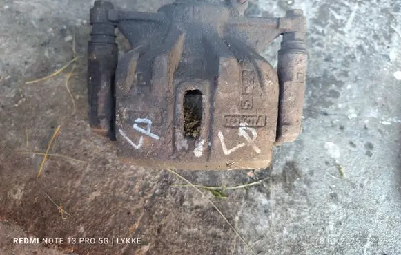 Toyota Corolla E110 Front brake caliper