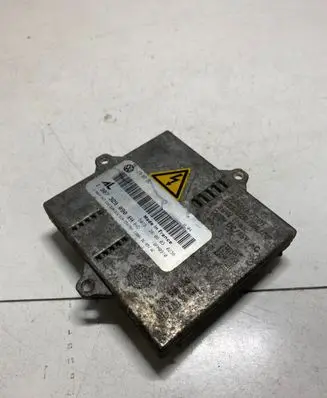 Volkswagen Touran I Headlight ballast module Xenon 1T0907391 1307329090