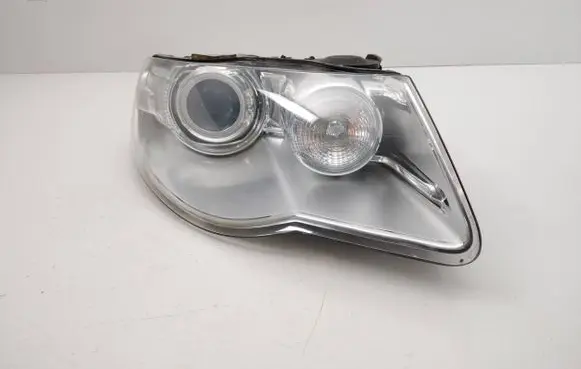 Volkswagen Touareg I Headlight/headlamp 1ZS009452