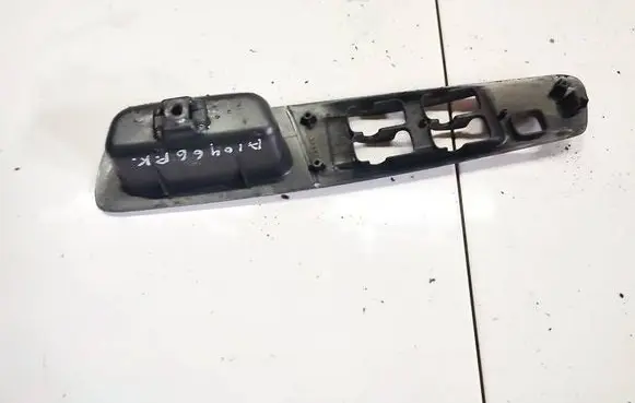 Mitsubishi Galant Front door window switch trim xr216721