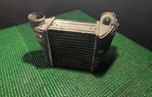 Volkswagen Golf IV Intercooler radiator 1J0145803G