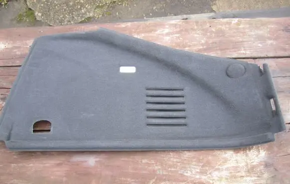 Trunk/boot lower side trim panel