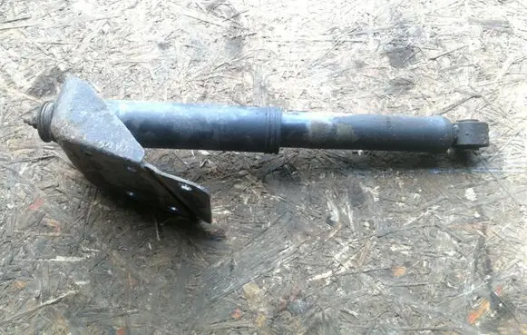 KIA Carnival Rear shock absorber/damper 0K55F28700B