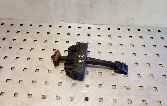 Front door check strap stopper