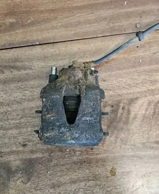 Volkswagen Golf IV Front brake caliper