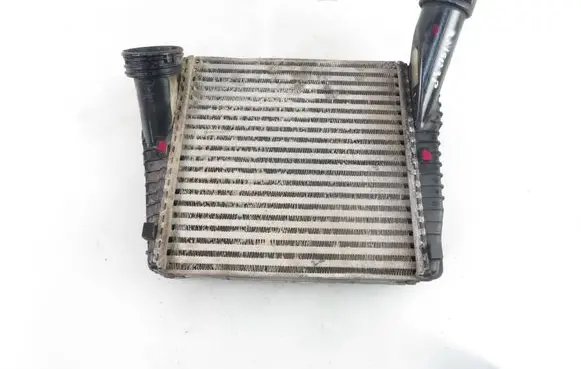 Volkswagen Touareg I Intercooler radiator 7L0145804A