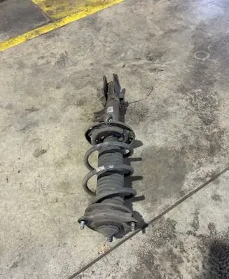 KIA Sportage Front shock absorber with coil spring T16C08A0958