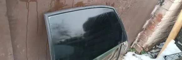 Rear door manual window regulator