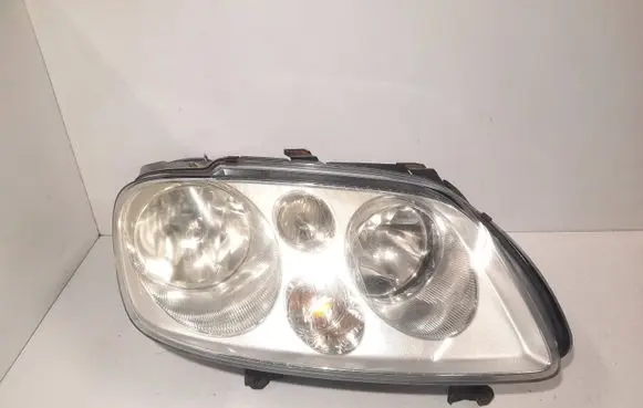 Volkswagen Touran I Headlight/headlamp 1T0941006D