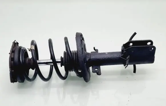 Renault Megane III Front shock absorber with coil spring