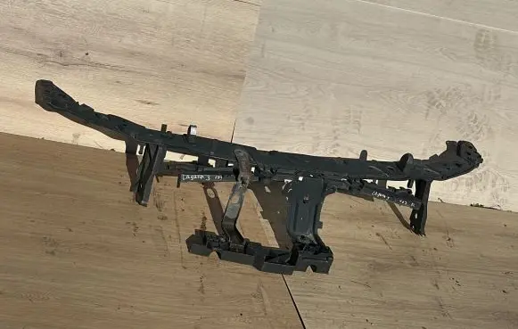 Top upper radiator support slam panel