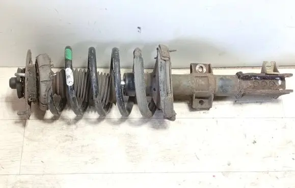 Volvo XC90 Front shock absorber with coil spring 31200630