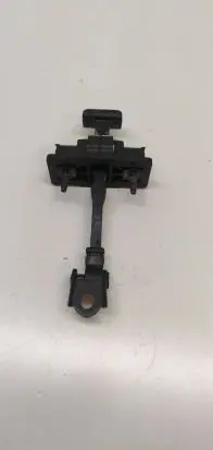 Front door check strap stopper