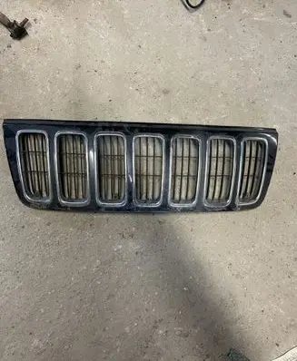 Jeep Grand Cherokee (WJ) Front bumper upper radiator grill 5GL79TRMAA 5GL79TRMA