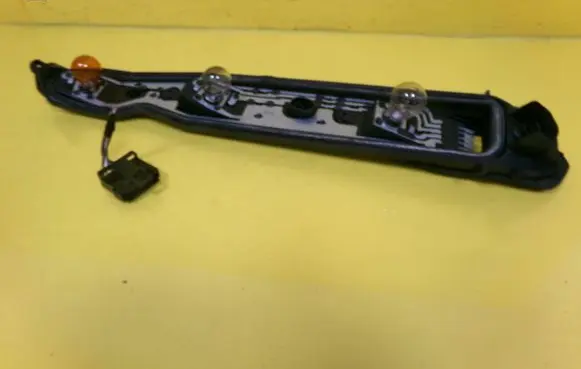 Opel Corsa C Tail light bulb cover holder 