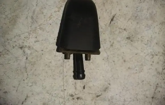 Headlight washer spray nozzle