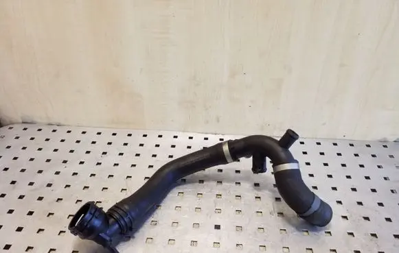 Volkswagen PASSAT B7 Engine coolant pipe/hose 1K0121087AH