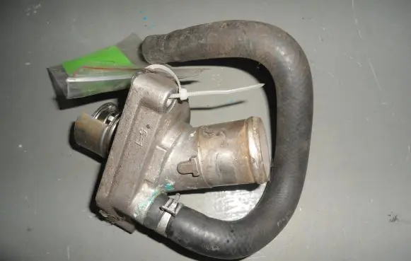 Thermostat/thermostat housing