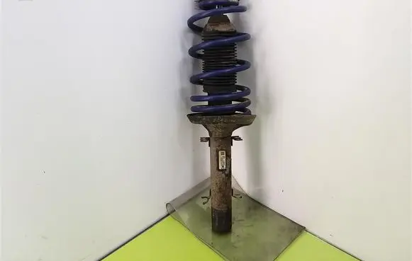 Volkswagen Golf IV Front shock absorber with coil spring 1J0413031T