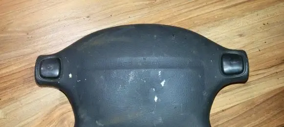 Mazda 323 Steering wheel airbag T93013A