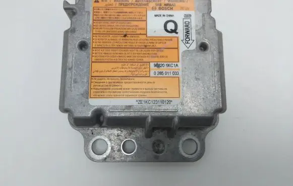 Nissan Juke I F15 Airbag control unit/module 988201KC1A 0285011033