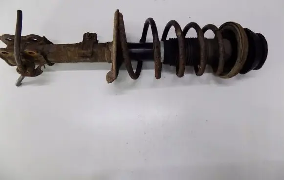 Suzuki Swift I Front shock absorber with coil spring 5gyugjhjiok786hj
