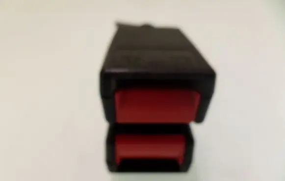 Middle seatbelt buckle (rear)