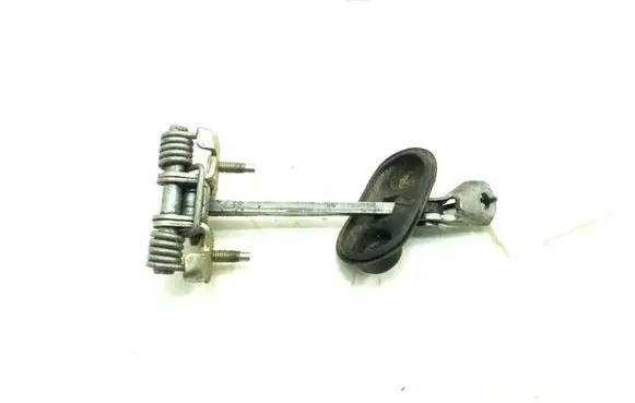Front door check strap stopper