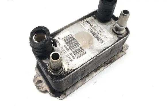 Jaguar XF Engine oil radiator AW837A095AA